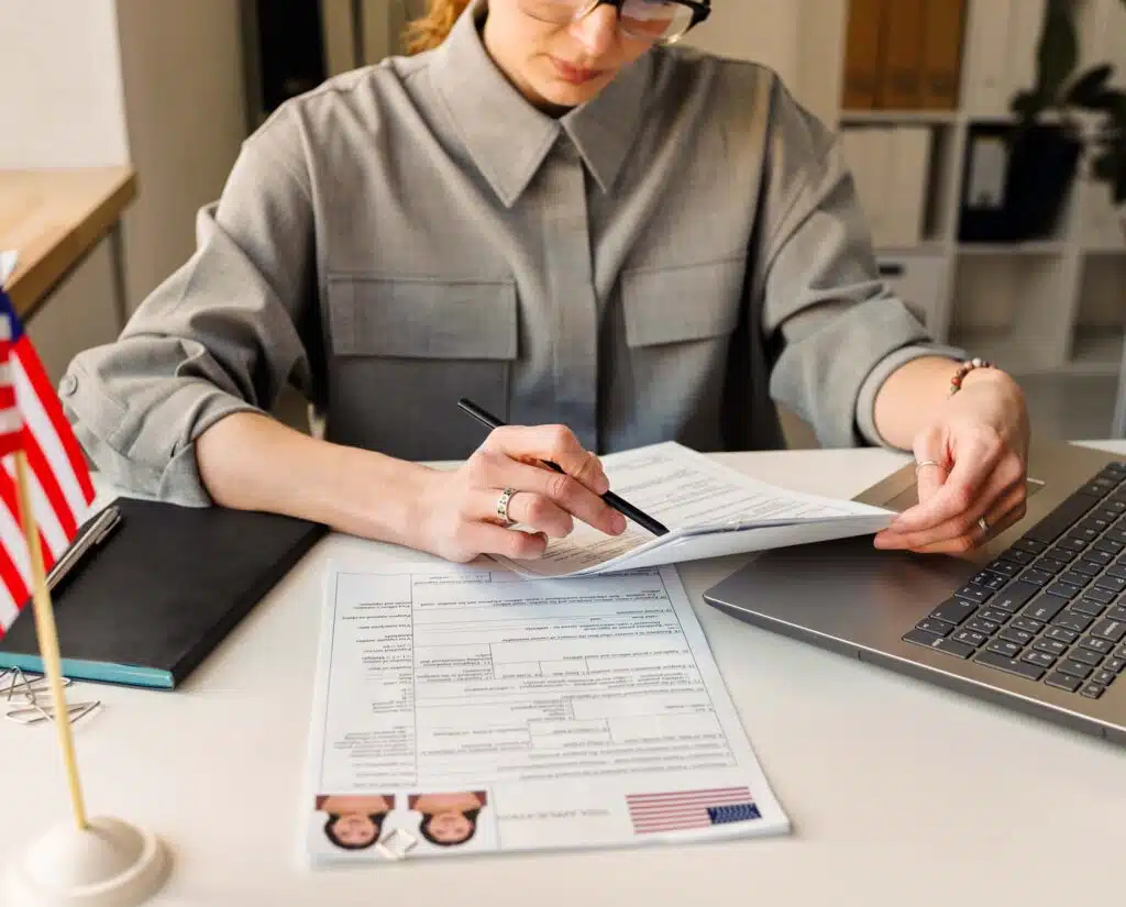 Immigration attorney discussing green card options with a client who overstayed their visa