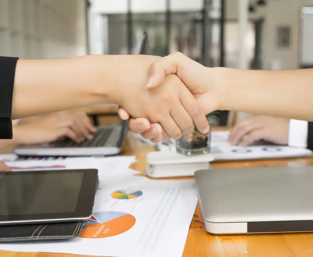 Lawyer shaking hands with a client