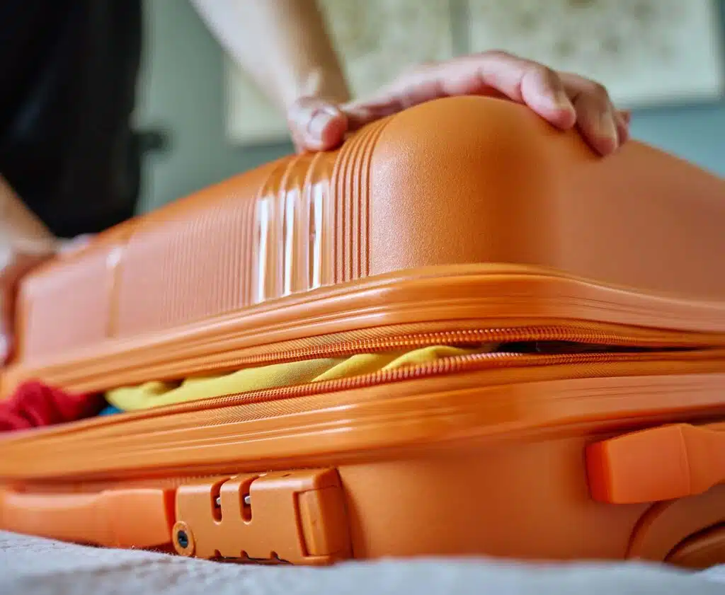 A suitcase being closed